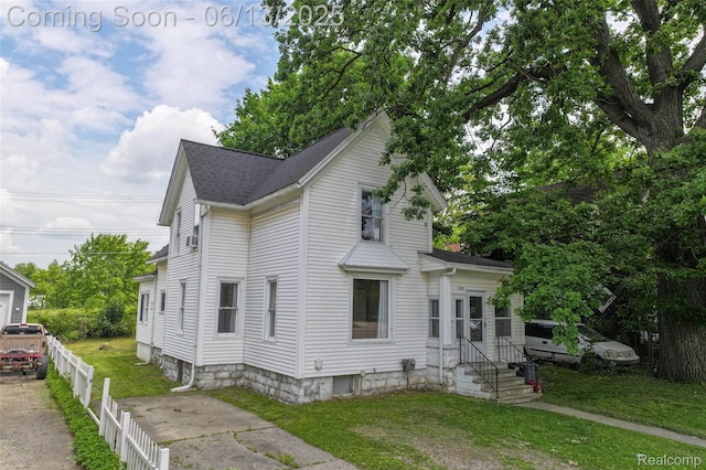 1226 W Genesee St, Lapeer, MI 48446 - view of front facade with a shingled roof