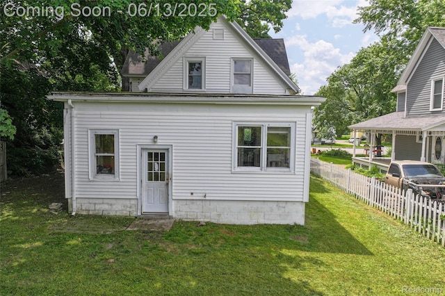 1226 W Genesee St, Lapeer, MI 48446 - rear view of property with a shingled roof