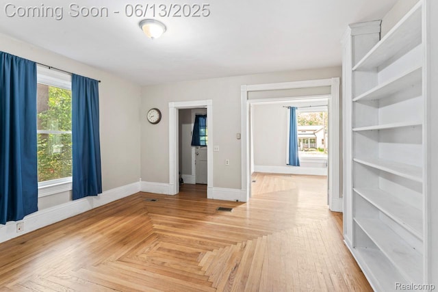 1226 W Genesee St, Lapeer, MI 48446 - empty room with baseboards