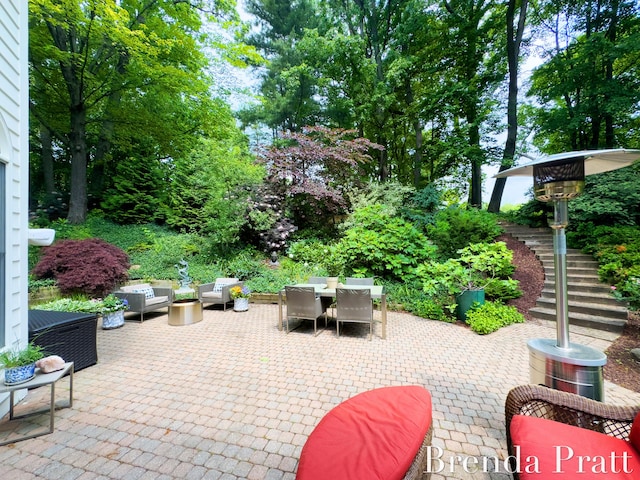 5691 Forest Gln SE, Ada, MI 49301 - view of patio featuring stairway and outdoor dining space