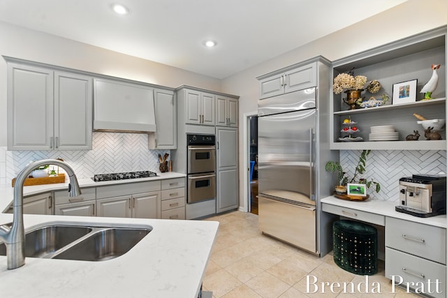 5691 Forest Gln SE, Ada, MI 49301 - kitchen with gray cabinets, stainless steel appliances, decorative backsplash, light countertops, and recessed lighting