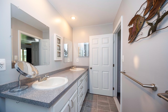 9128 Clover Dr, Milan, MI 48160 - full bathroom featuring double vanity and tile patterned floors