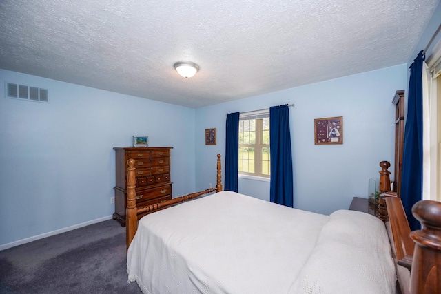 9128 Clover Dr, Milan, MI 48160 - bedroom featuring dark carpet and a textured ceiling