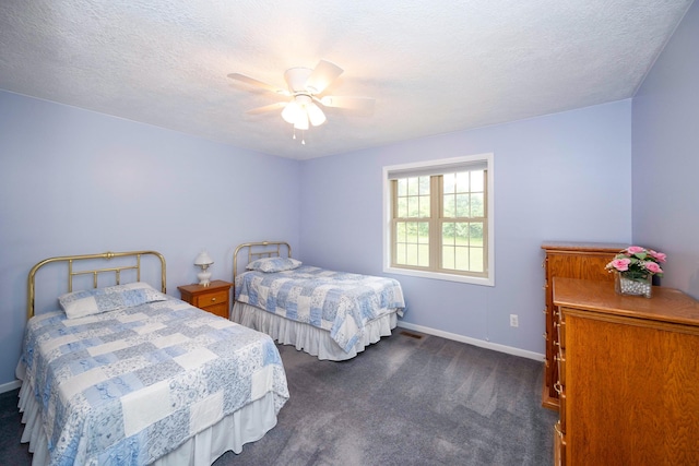 9128 Clover Dr, Milan, MI 48160 - bedroom featuring dark colored carpet, a ceiling fan, and a textured ceiling
