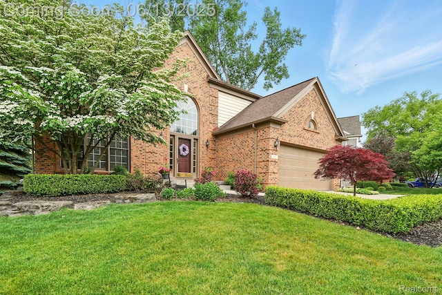 1377 Lake Shore Blvd, Lake Orion, MI 48362 - view of front of property with brick siding, an attached garage, a front lawn, and roof with shingles