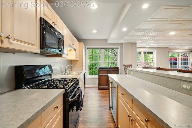 1377 Lake Shore Blvd, Lake Orion, MI 48362 - kitchen featuring black appliances, dark wood-style floors, beverage cooler, light brown cabinetry, and recessed lighting