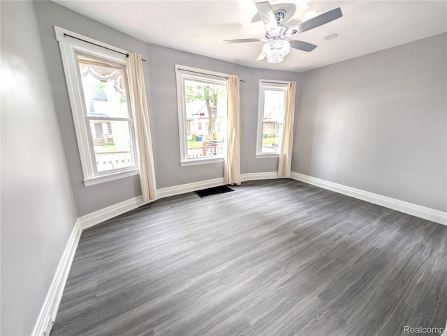 3639 Farnsworth St, Detroit, MI 48211 - unfurnished room with dark wood finished floors and a ceiling fan