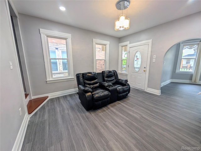 3639 Farnsworth St, Detroit, MI 48211 - entrance foyer featuring wood finished floors, a chandelier, arched walkways, and recessed lighting