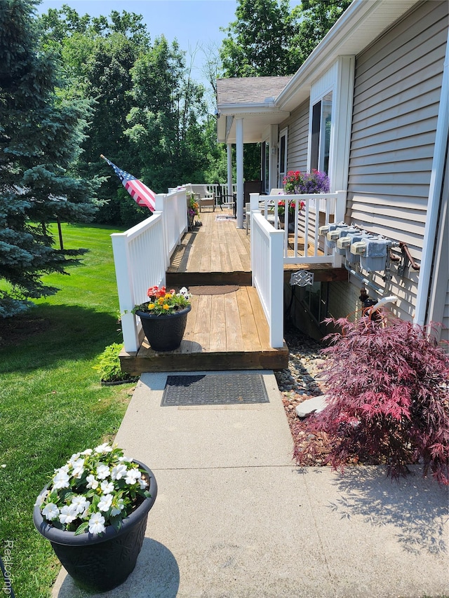 9520 Timber Ridge Dr, Grand Blanc, MI 48439 - deck featuring a yard
