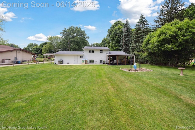 4098 Sam Snead Dr, Flint, MI 48506 - back of property with a patio area
