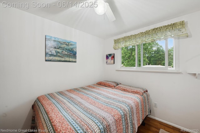 4098 Sam Snead Dr, Flint, MI 48506 - bedroom with wood finished floors and a ceiling fan