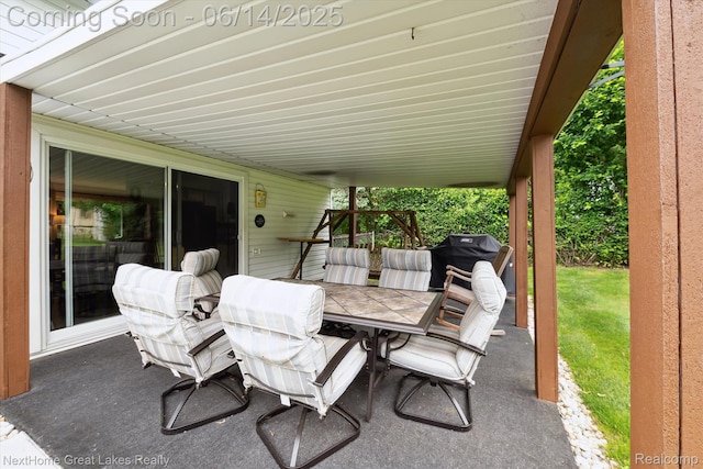 4098 Sam Snead Dr, Flint, MI 48506 - view of patio with outdoor dining area and grilling area
