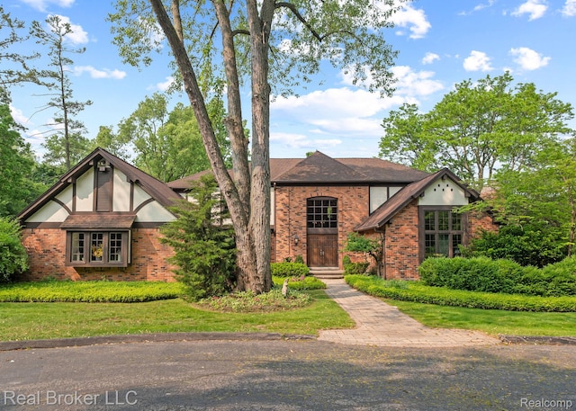 1299 Orchard Ridge Rd, Bloomfield Hills, MI 48304 - tudor house with brick siding