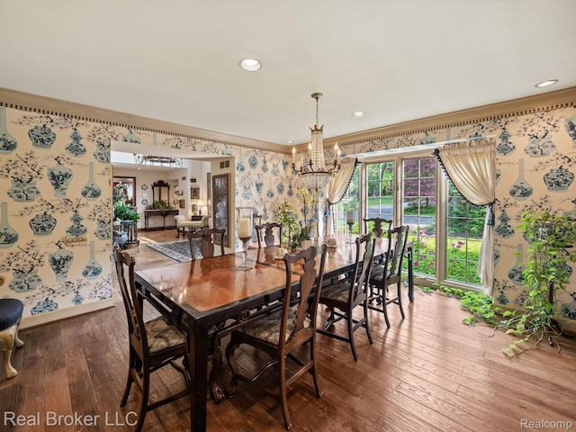 1299 Orchard Ridge Rd, Bloomfield Hills, MI 48304 - dining room featuring wallpapered walls, wood-type flooring, a chandelier, healthy amount of natural light, and ornamental molding