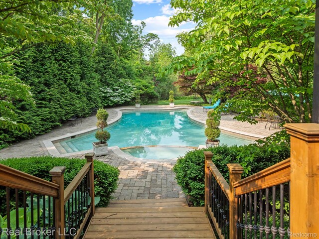 1299 Orchard Ridge Rd, Bloomfield Hills, MI 48304 - view of swimming pool with a pool with connected hot tub and a patio area