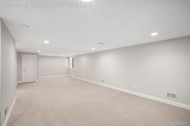 1060 Smith Ave, Birmingham, MI 48009 - finished basement with light colored carpet and recessed lighting