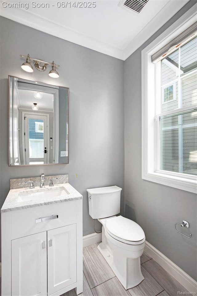 1060 Smith Ave, Birmingham, MI 48009 - bathroom featuring baseboards and vanity