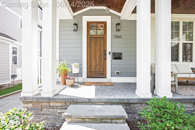 1060 Smith Ave, Birmingham, MI 48009 - doorway to property featuring covered porch