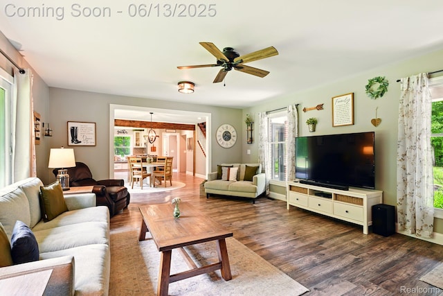 6535 Cedar Lake Rd, Pinckney, MI 48169 - living area with healthy amount of natural light and dark wood-style flooring