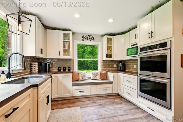 6535 Cedar Lake Rd, Pinckney, MI 48169 - kitchen with stainless steel appliances, healthy amount of natural light, dark countertops, and recessed lighting
