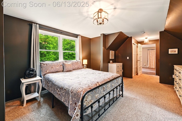6535 Cedar Lake Rd, Pinckney, MI 48169 - bedroom featuring light carpet and a chandelier
