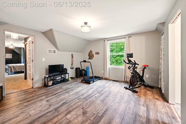 6535 Cedar Lake Rd, Pinckney, MI 48169 - exercise area with wood finished floors and lofted ceiling
