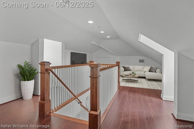 1260 W Ann Arbor Trl, Plymouth, MI 48170 - corridor with an upstairs landing, wood finished floors, vaulted ceiling, a skylight, and recessed lighting