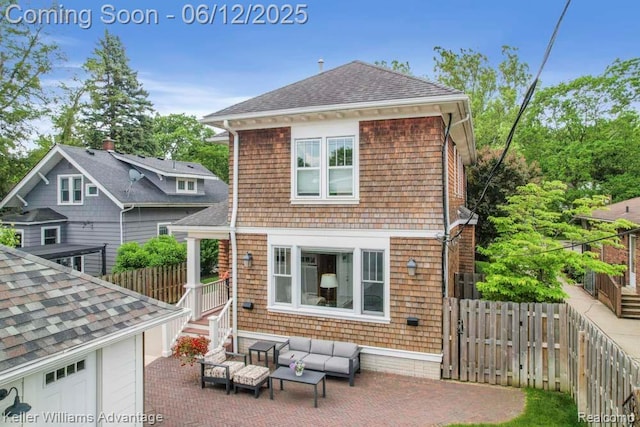 1260 W Ann Arbor Trl, Plymouth, MI 48170 - rear view of property with outdoor lounge area, a patio, and a shingled roof
