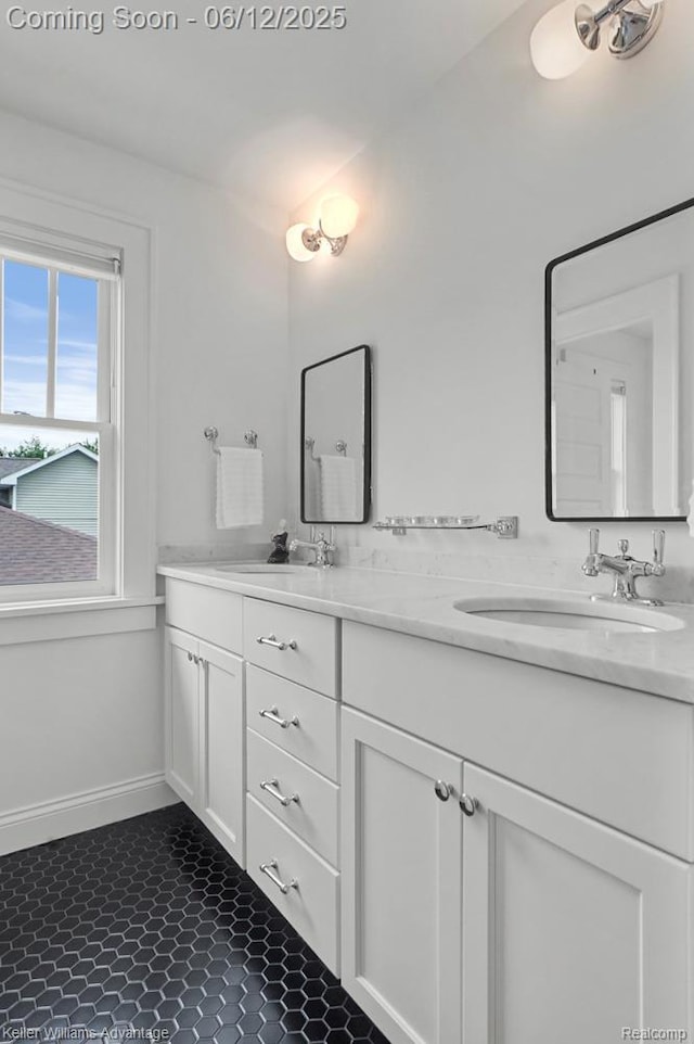 1260 W Ann Arbor Trl, Plymouth, MI 48170 - bathroom featuring double vanity and tile patterned floors
