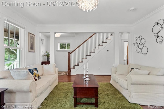 1260 W Ann Arbor Trl, Plymouth, MI 48170 - living area with stairs, wood finished floors, ornamental molding, and a chandelier