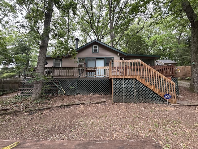 2112 Timber Ln, Brooklyn, MI 49230 - back of house featuring a deck and stairway