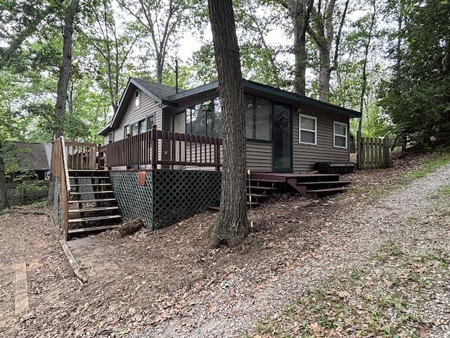 2112 Timber Ln, Brooklyn, MI 49230 - view of home's exterior featuring stairs and a deck