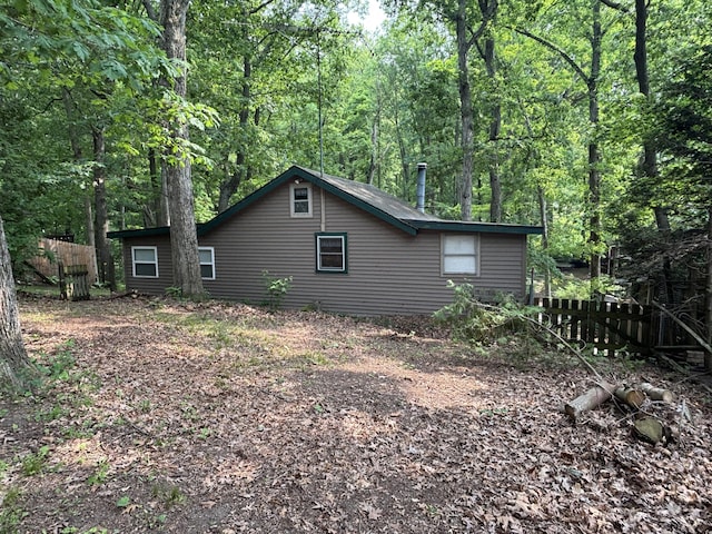 2112 Timber Ln, Brooklyn, MI 49230 - view of side of home with a wooded view