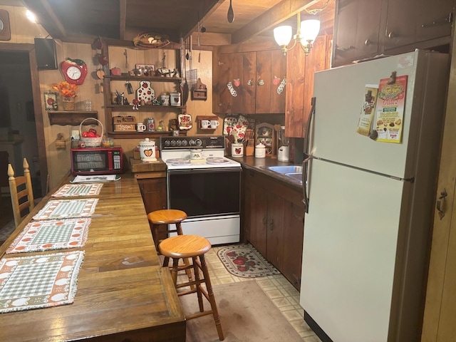 2112 Timber Ln, Brooklyn, MI 49230 - kitchen with white appliances and a sink