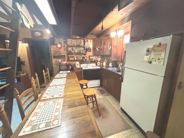 2112 Timber Ln, Brooklyn, MI 49230 - kitchen with white appliances and a sink