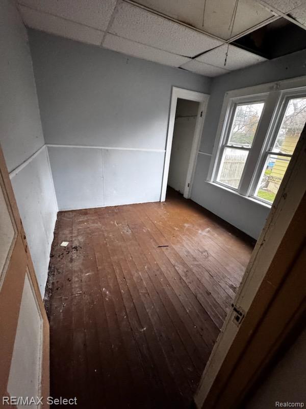 1108 Maginn Ct, Mount Morris, MI 48458 - spare room with hardwood / wood-style floors