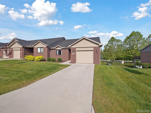 1470 Duncan Dr, Chelsea, MI 48118 - single story home featuring a garage, driveway, brick siding, and a front lawn