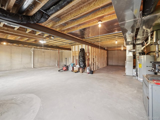 1470 Duncan Dr, Chelsea, MI 48118 - unfinished below grade area with water heater and heating unit