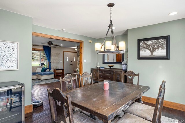 3985 Wadhams Rd, China, MI 48054 - dining area featuring wine cooler, hardwood / wood-style floors, a ceiling fan, and recessed lighting