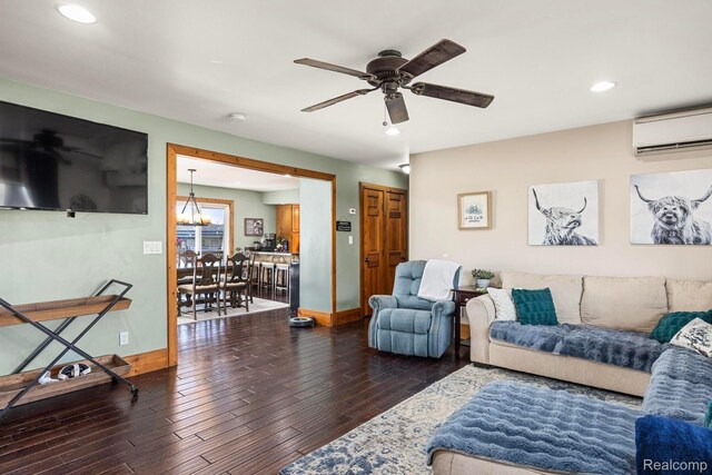 3985 Wadhams Rd, China, MI 48054 - living area with wood finished floors, an AC wall unit, recessed lighting, and ceiling fan