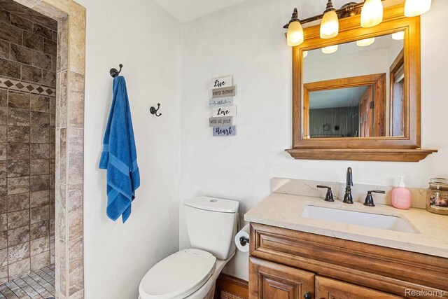 3985 Wadhams Rd, China, MI 48054 - bathroom featuring vanity and a tile shower