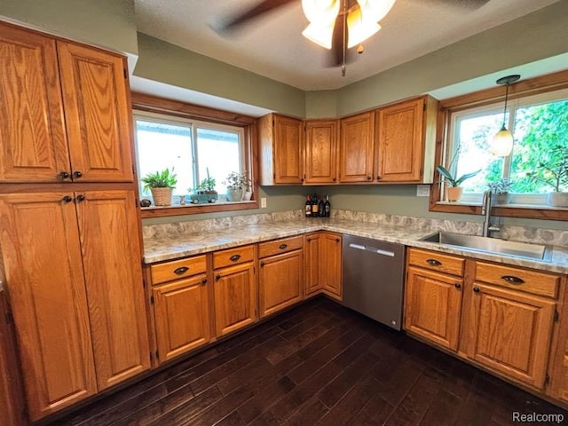 3985 Wadhams Rd, China, MI 48054 - kitchen featuring stainless steel dishwasher, light countertops, a ceiling fan, and brown cabinets
