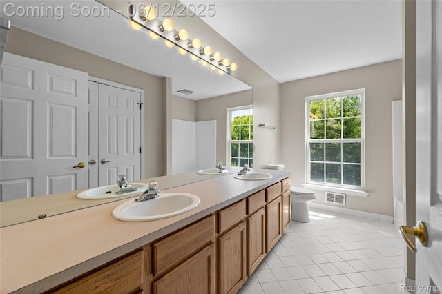 49620 Dunhill Dr, Macomb, MI 48044 - bathroom featuring double vanity and tile patterned flooring