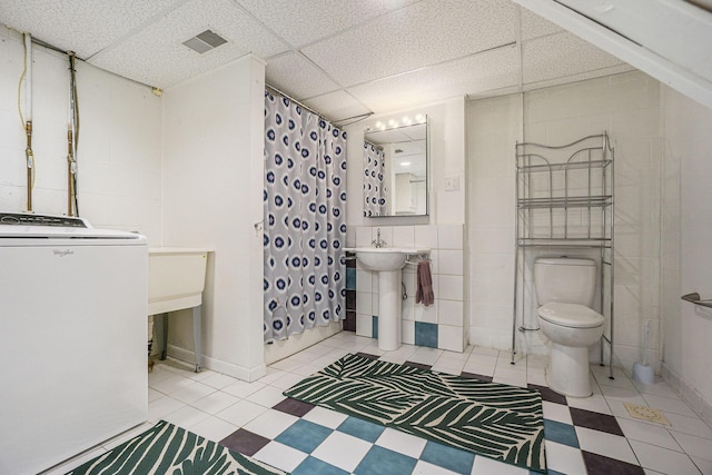 6037 Cypress St, Portage, MI 49024 - full bath featuring washer / clothes dryer, a shower with shower curtain, and a paneled ceiling