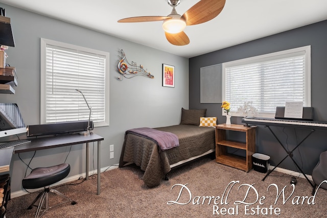 6662 Adaridge Dr SE, Ada, MI 49301 - carpeted bedroom with ceiling fan and a desk