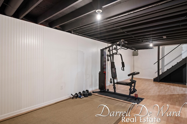 6662 Adaridge Dr SE, Ada, MI 49301 - exercise area featuring baseboards and wood finished floors