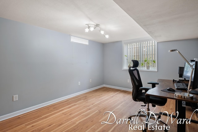 6662 Adaridge Dr SE, Ada, MI 49301 - office area with wood finished floors and baseboards