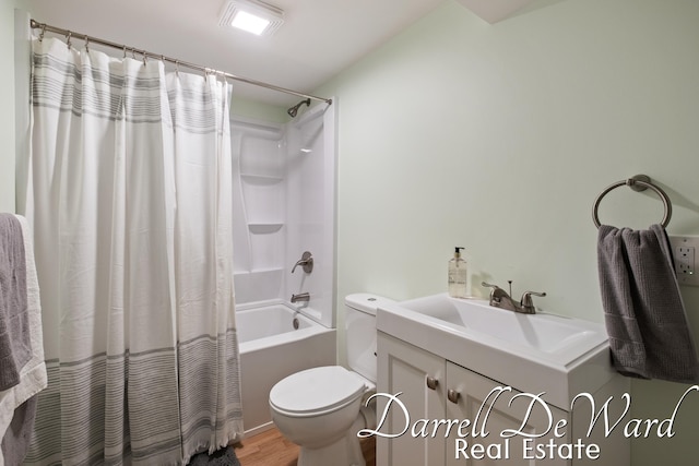 6662 Adaridge Dr SE, Ada, MI 49301 - full bath with shower / tub combo with curtain, vanity, and wood finished floors