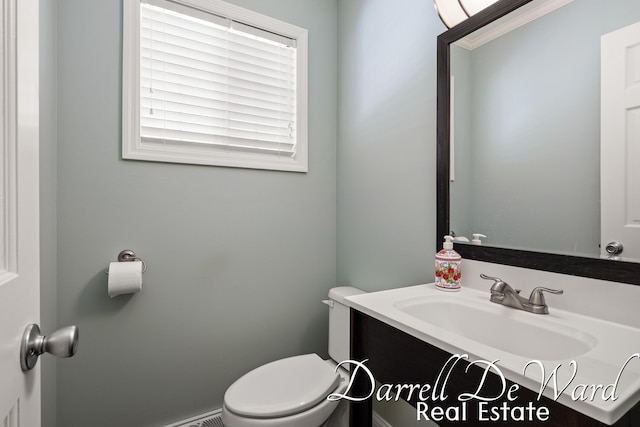 6662 Adaridge Dr SE, Ada, MI 49301 - bathroom with vanity and toilet