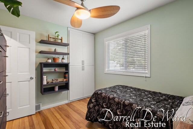 6662 Adaridge Dr SE, Ada, MI 49301 - bedroom with light wood-style flooring and a ceiling fan